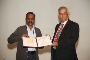 Prof. Kumaresan receiving the INSA award